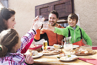 family cheers with water glasses