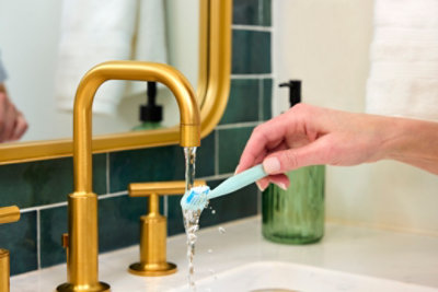 Toothbrush Under Bathroom Faucet - High End Residential Lifestyle Photoshoot
